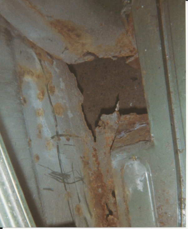 under fuel tank in boot